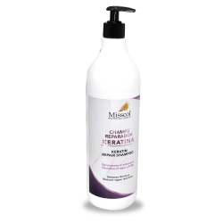 Champú reparador de...